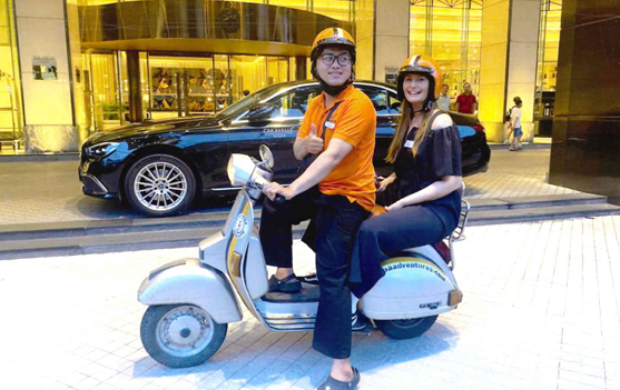 Alana on her Vespa adventure exploring the local sights and street food.